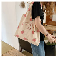 peaches-yellow large tote bag